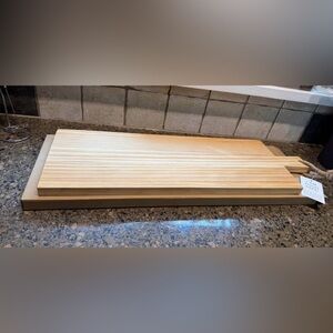Hinoki Cypress reversible wood paddle cutting board. New in box